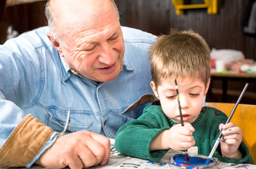 Grandson and grandfather painting