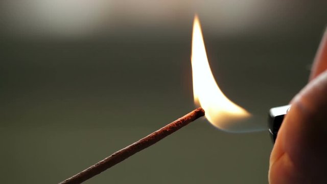 Ignite an incense stick