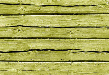Yellow color log house wall.