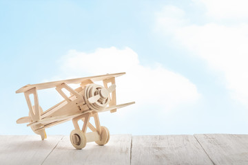 toy airplane on wood
