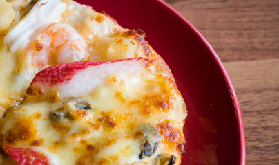 Still-life seafood pizza at italian restaurant