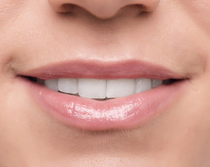 Fototapeta premium Beautiful wide smile of young woman.