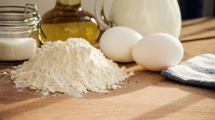 Pancakes ingredients. Milk egg flour oil sugar.