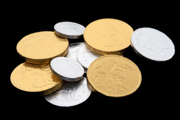 Pile of gold and silver chocolate coins
