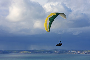 Paraglider above Whitsand Bay