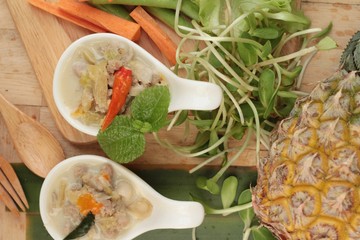 Spicy simmer pineapple with pork and vegetables.