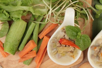 Spicy simmer pineapple with pork and vegetables.