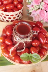 Tomato juice and pear cherry tomatoes.