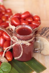 Tomato juice and pear cherry tomatoes.