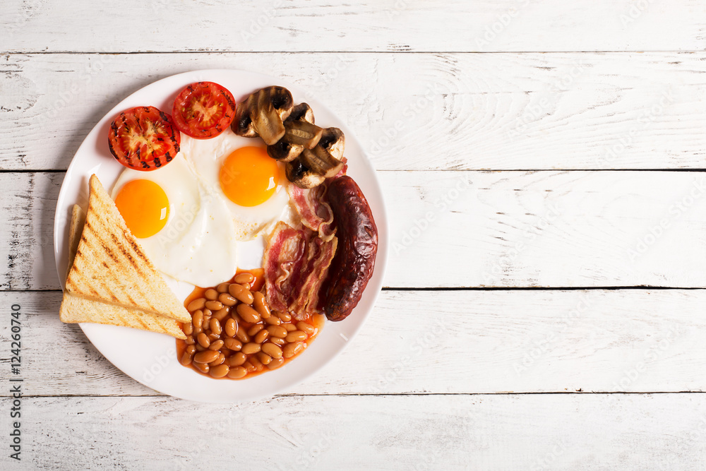 Wall mural english breakfast on a white wooden table