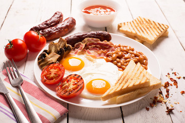 English breakfast on a white wooden table