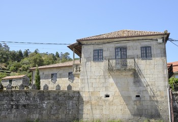 Fototapeta na wymiar Stone building and traditional Galician granary in Hio, Galicia, Spain
