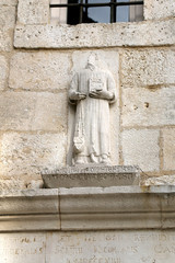 Old statue on a historic church park Sustipan. In Split, Croatia.
