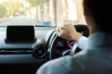 Close-up of Young man driving on the road