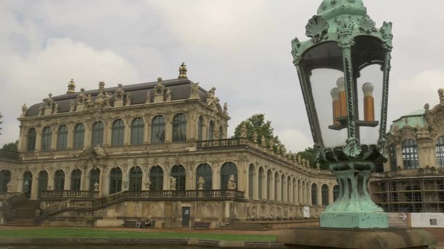Pan from ornate lamp to fountain in Zwinger Palace in Dresden