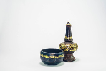 thai porcelain with designs in golden running scroll design