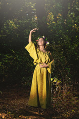 Fototapeta premium Fantasy Fairy Tale Forest , young woman posing as nymph
