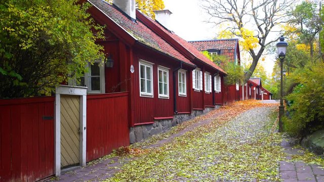 Traditional wooden houses along a picturesque street at Sodermalm, the southern part of central Stockholm.