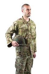 Confident soldier standing with a helmet