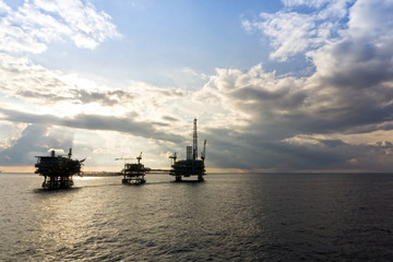Silhouette of oil rig or platform at oilfield in Malaysia