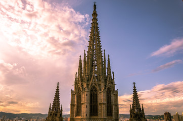 Fototapeta na wymiar Barcelona Cathedral Towers rooftops at sunset