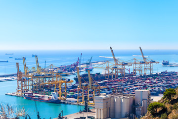 Panoramic view of the port in Barcelona, Spain. Cargo port with cars, containers and cargo ships.