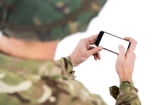 Soldier Using A Mobile Phone