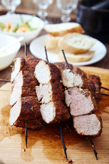 Skewered meat or shish kebabs of pork in marinade