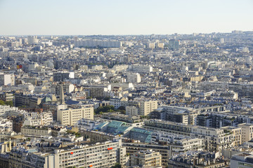 Wide angle view over the city of Paris on a hot summer day - aerial shot