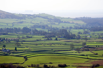 Fototapeta na wymiar Rural landscape of rolling hills and pastures