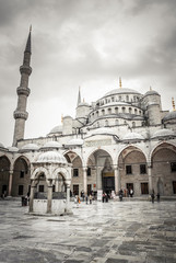 Fototapeta na wymiar The Blue Mosque, Istanbul, Turkey.. Tourists visiting Blue Mosque, Sultanahmet Camii.