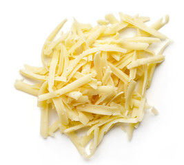 Grated cheese isolated on white, from above