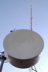 Antenna relay communication. Tower with antennas relay link.