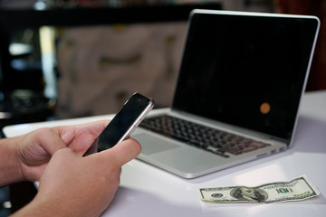 A man paying for online shopping