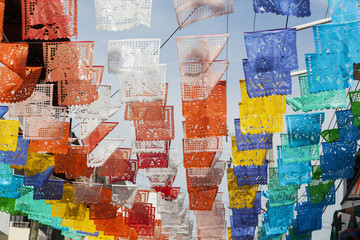 Colourful mexican fiesta flags decorate a street;Puerto vallarta mexico