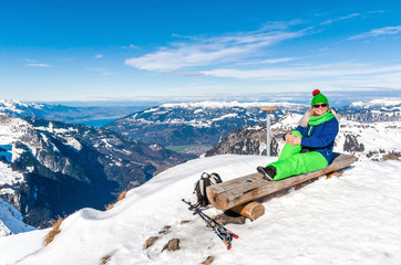 Happy man on the top of the Alps