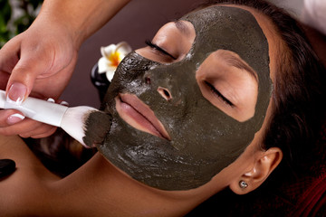 asian womam in spa treatment,facial mask with algae
