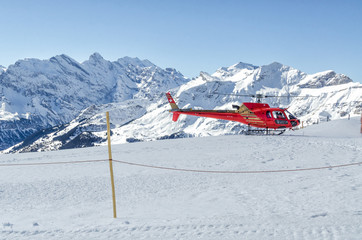 Fototapeta premium Swiss helicopter rescue in the mountains