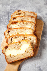 Sliced banana bread with cream cheese