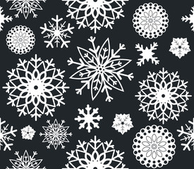 Seamless patttern with stylish snowflakes isolated on blue backg