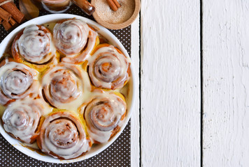 Cinnamon rolls for breakfast on a white background. The space un