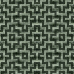 Knitting geometrical seamless pattern in muted colors