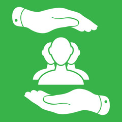 two hands with group of businessman icon on a green background -