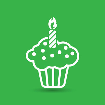 white flat cake icon on a green background