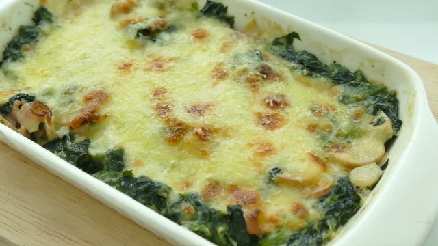 Spinach lasagna in white plate
