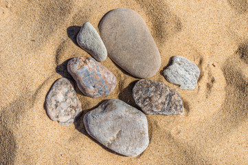Fototapeta na wymiar Sand and stone pebbles