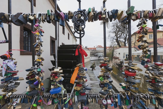 Love locks attached to a metal fence