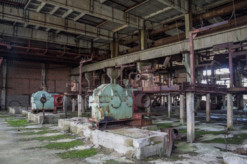 Interior of machinery of abandoned factory of synthetic rubber