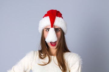 Woman in red christmas hat