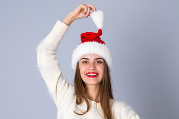 Woman in red christmas hat